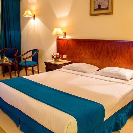 Serenity Alpha Beach - Ex Serenity Makadi Beach Exterior foto A bedroom in a hotel